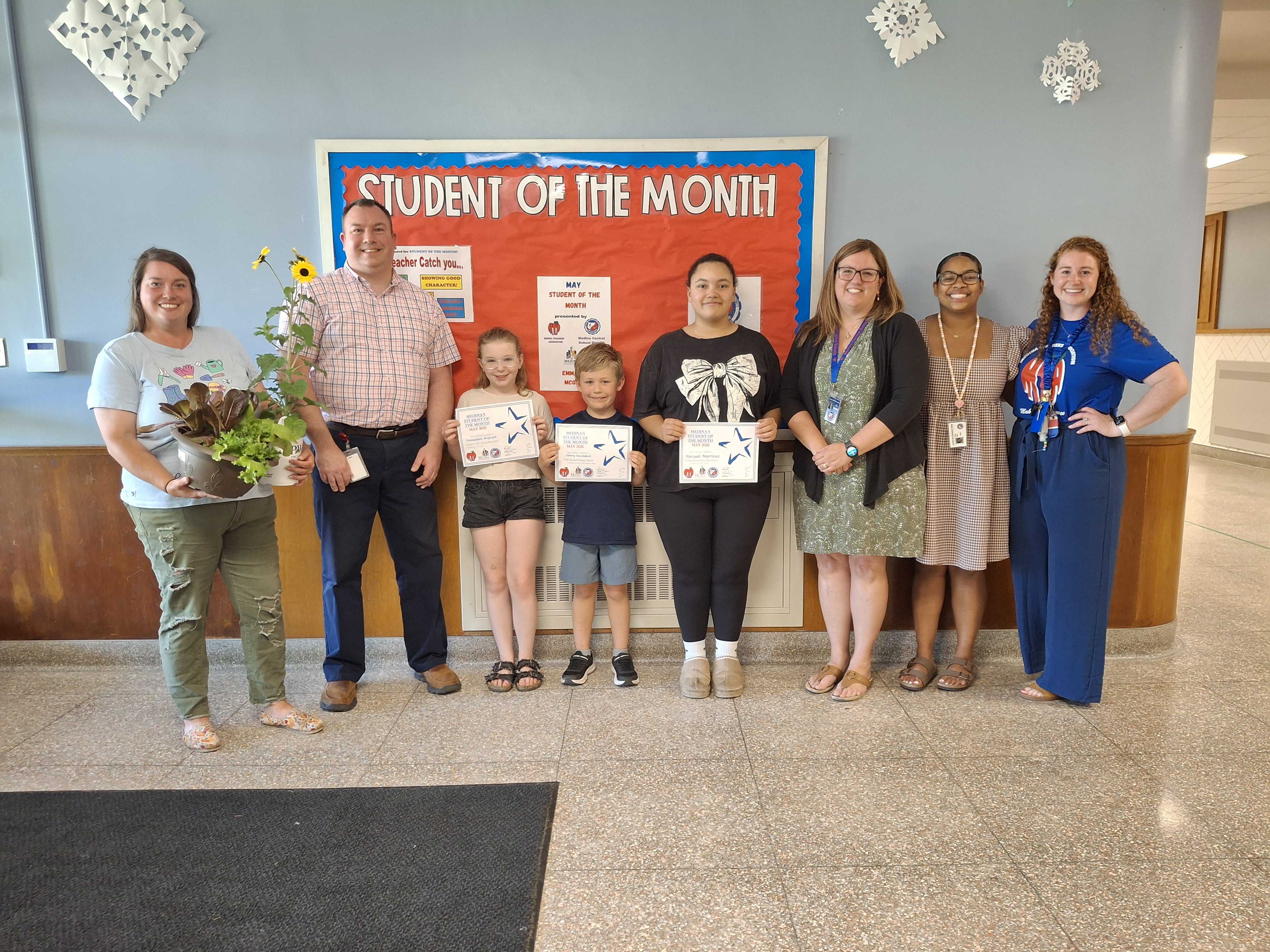 Group of adults and children for the getting Student of the Month - May 2026
